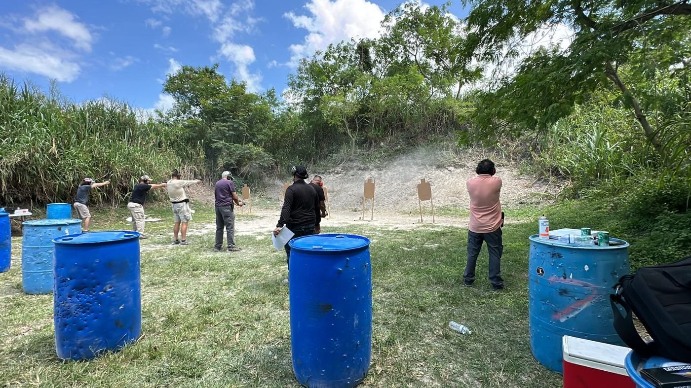 Alpha One students on the firing line at the outdoor range